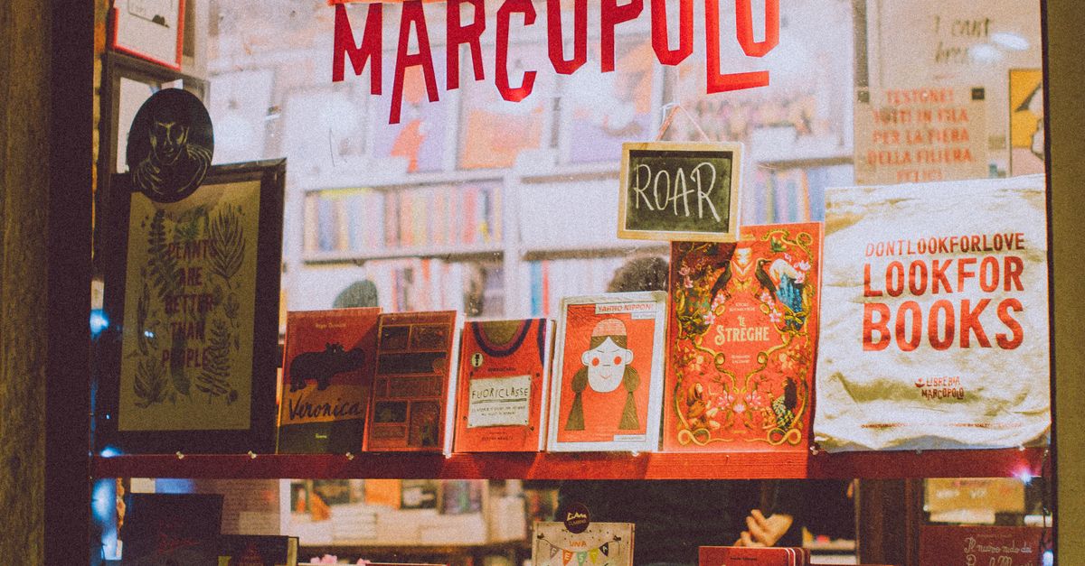 Illuminated Window Display of a Bookstore · Free Stock Photo