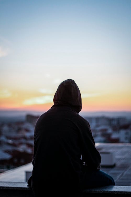 Free Man Sitting on Bench Stock Photo