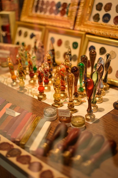 Free A vibrant display of colorful antique seals at a Venetian exhibition. Stock Photo