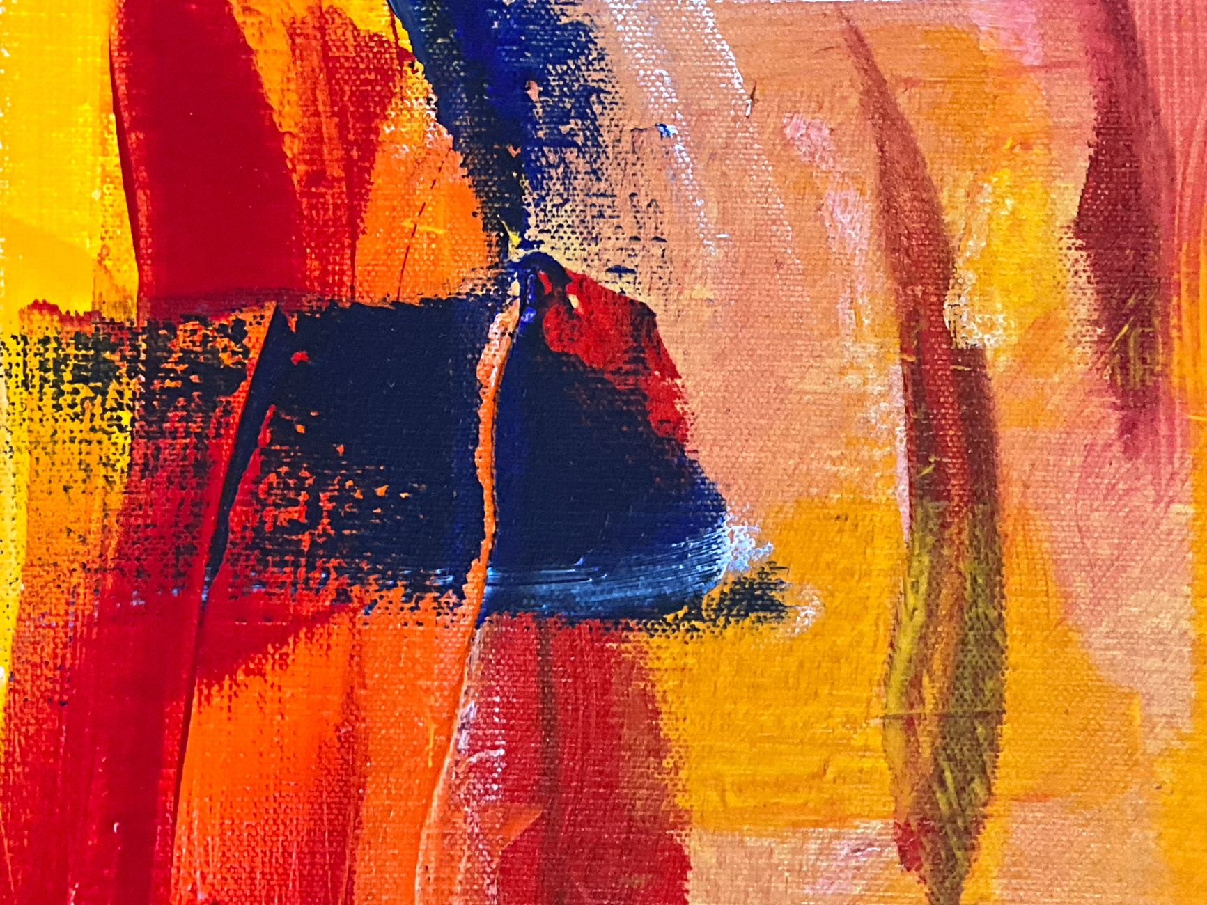 Bright and bold abstract painting with vivid red, yellow, and blue colors in expressive strokes.