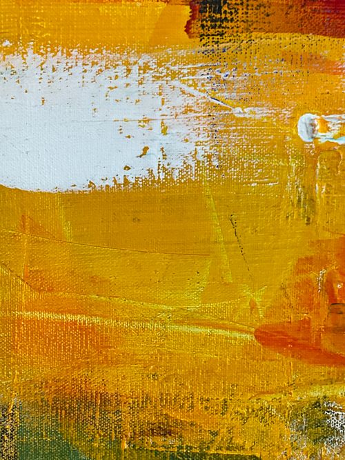 Free Dynamic abstract painting with vibrant yellow and white brushstrokes on canvas. Stock Photo