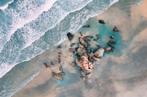 Aerial Shot of Rocks on Shore