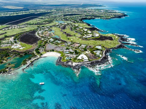 Photo by Josh Withers Stunning aerial shot of Waimea, HI showcasing the coastline and tropical scenery.