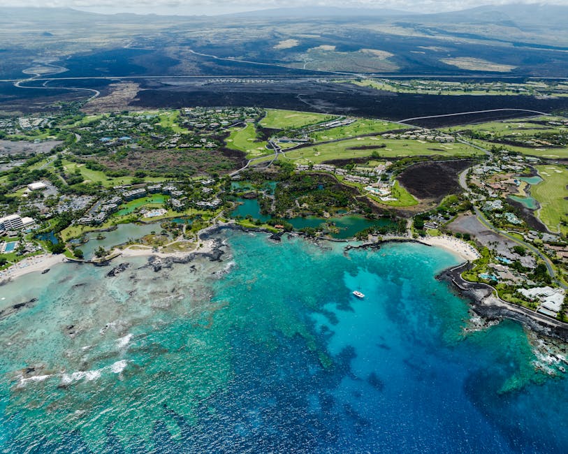 Photo by Josh Withers Explore the stunning turquoise waters and tropical landscape of Waimea Bay, Hawaii, from above.