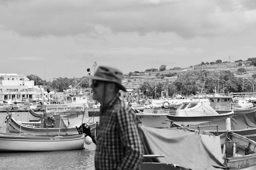 Black and White Photo of Boats and Yachts in a Marina 