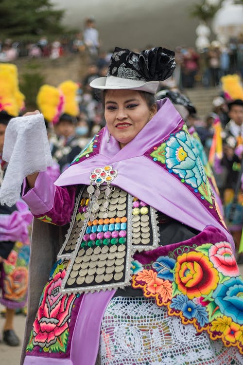 Woman in Traditional Clothing Posing on Parade