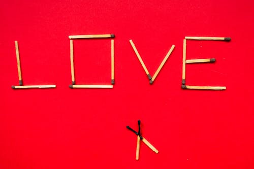 Word Love Formed with Matches 