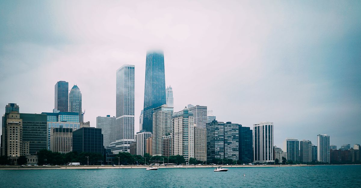 High Rise Buildings Near Body of Water · Free Stock Photo