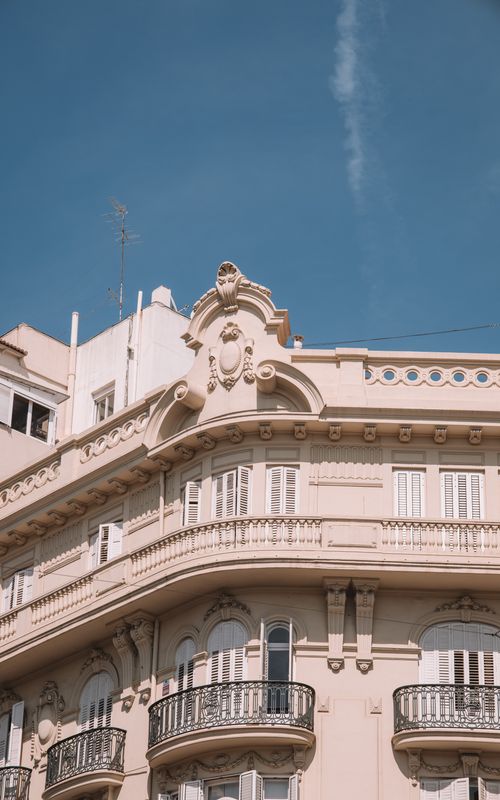 Free Beautiful neoclassical building exterior in Valencia, showcasing ornate architectural details against a clear sky. Stock Photo