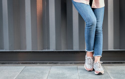 Free Person Wearing Sneakers Stock Photo
