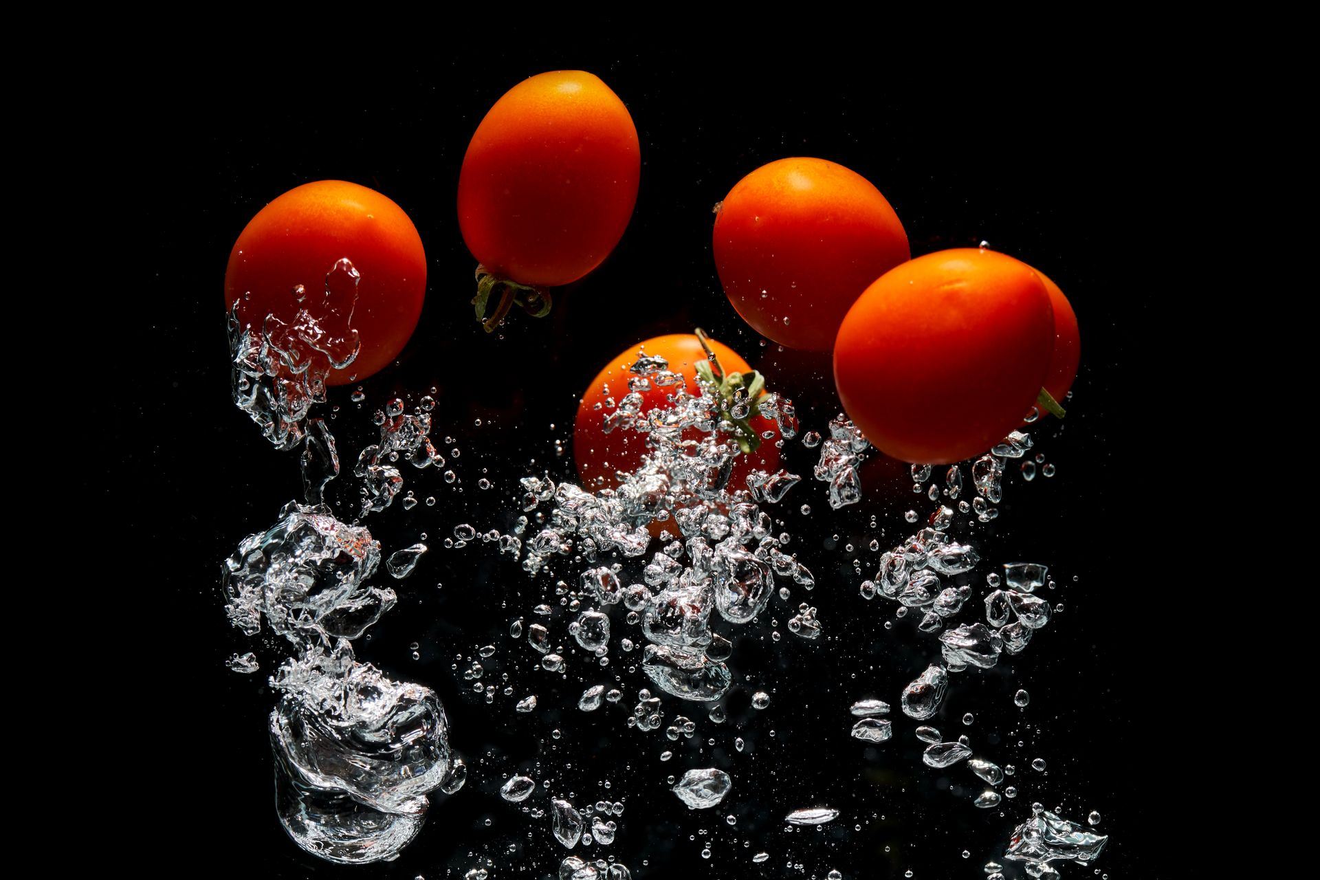 Five Tomatoes In Body Of Water