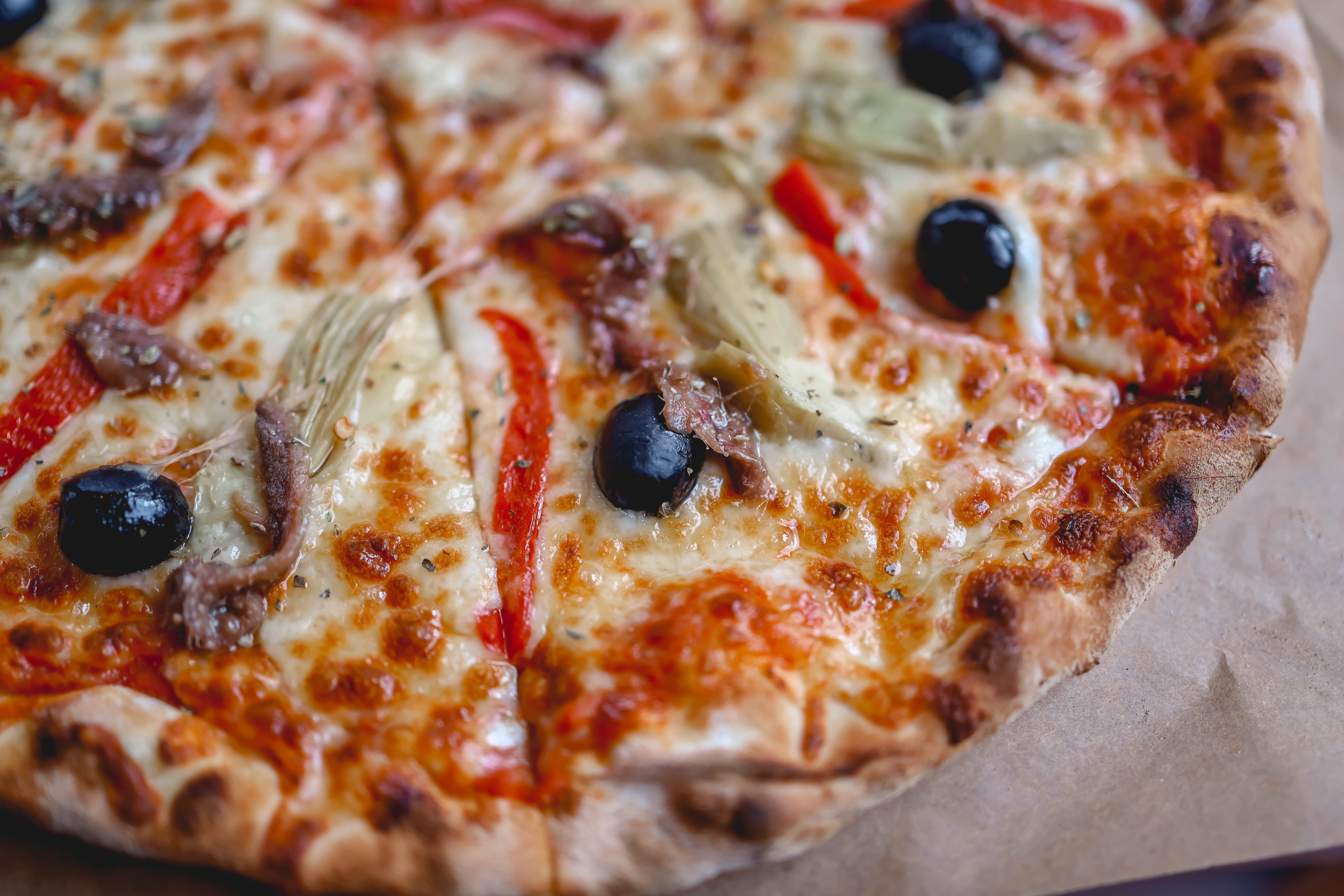 Margherita pizza with fresh basil and tomato