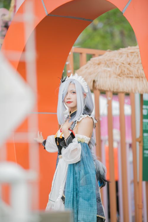 Free A colorful cosplay character posing outdoors at a summer festival, showcasing anime-inspired fashion. Stock Photo