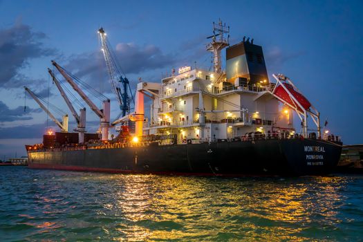 Cargo Ship Moored in Port in Evening