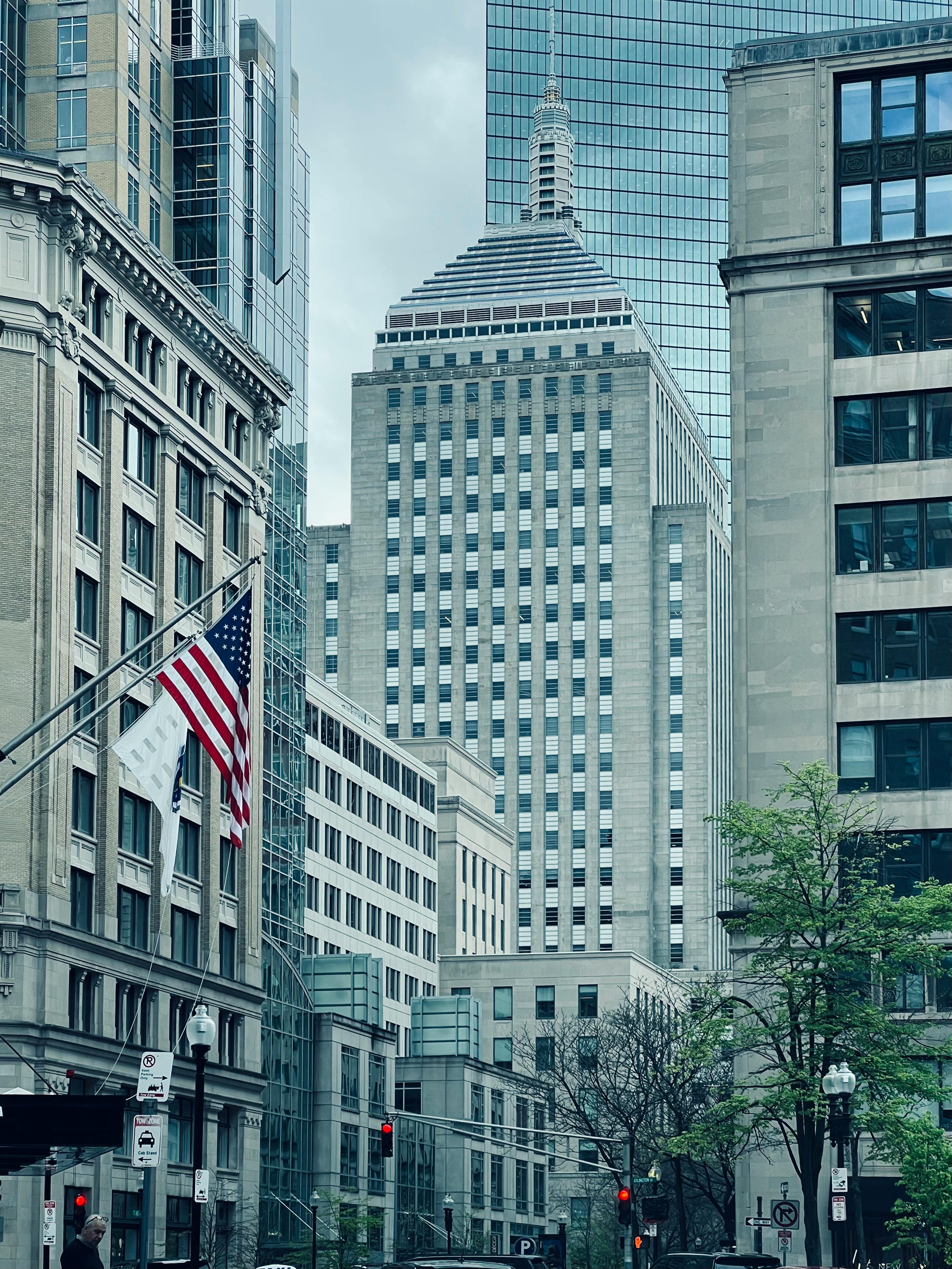 street with modern architecture and american flag