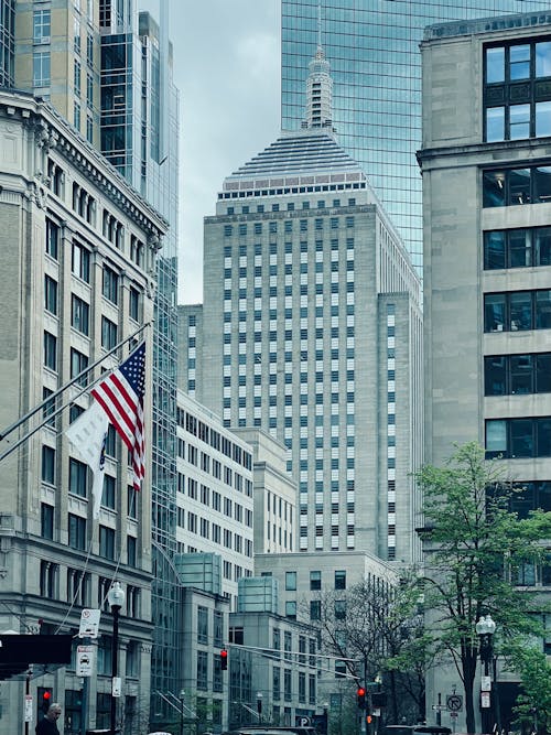 Street with Modern Architecture and American Flag 