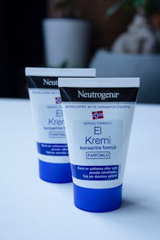 Close-up of two Neutrogena hand cream tubes with Nordic formula in a minimalistic setting.