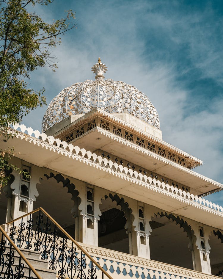 Low Angle Shot Of A Decorative Palace With A Cupola