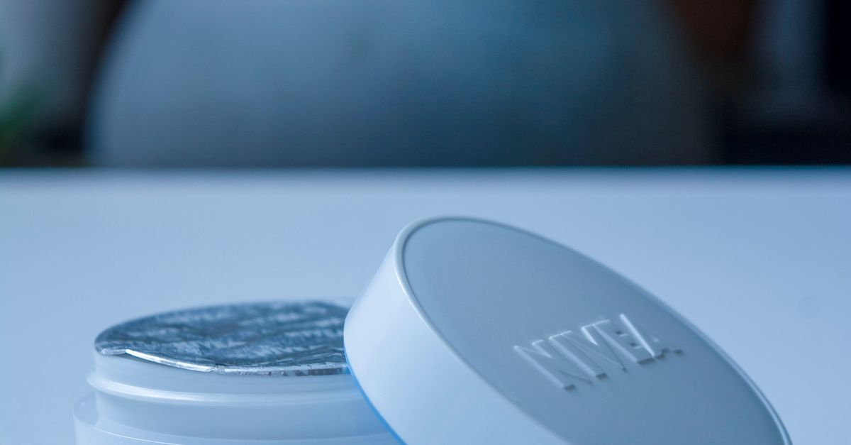 Close-up of a Container with Face Cream · Free Stock Photo