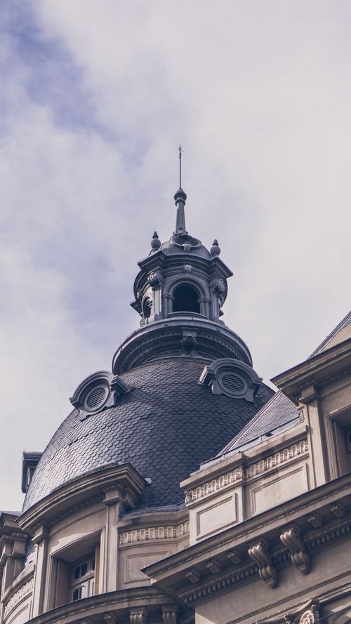 Free Low angle view of an ornate historical dome against a cloudy sky in Buenos Aires, Argentina. Stock Photo