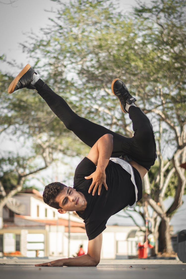 Man In Black T-shirt Breakdancing