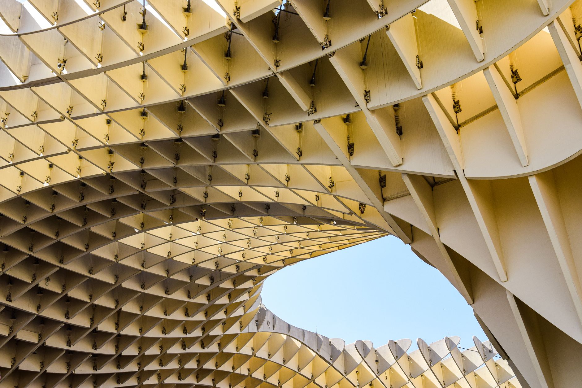 Low angle shot of the iconic Setas de Sevilla in Spain showcasing its unique modern architecture.