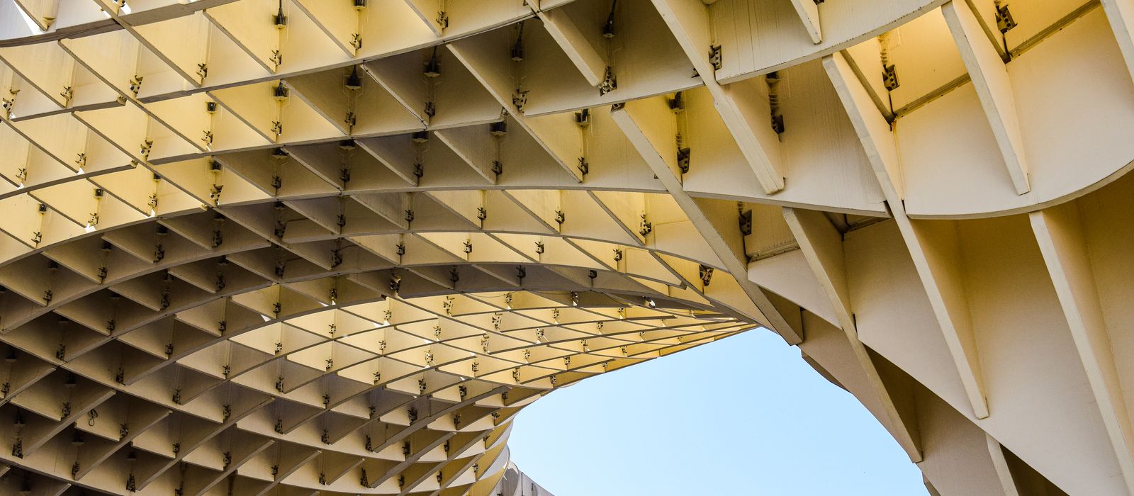 Low angle shot of the iconic Setas de Sevilla in Spain showcasing its unique modern architecture.