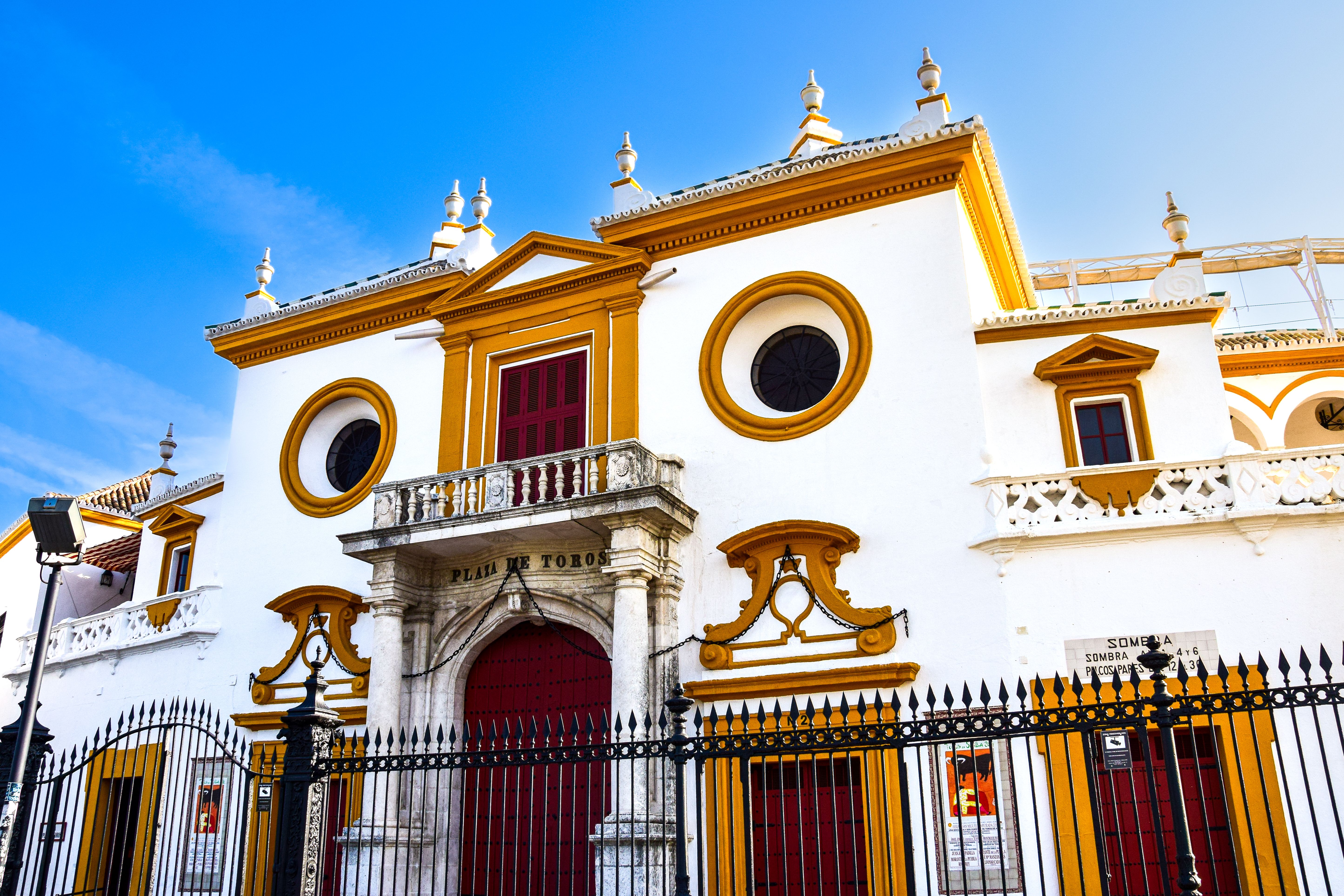 Explore the historic Plaza de Toros in Seville, Spain, a prominent bullring with stunning architecture. Explore the historic Plaza de Toros in Seville, Spain, a prominent bullring with stunning architecture.