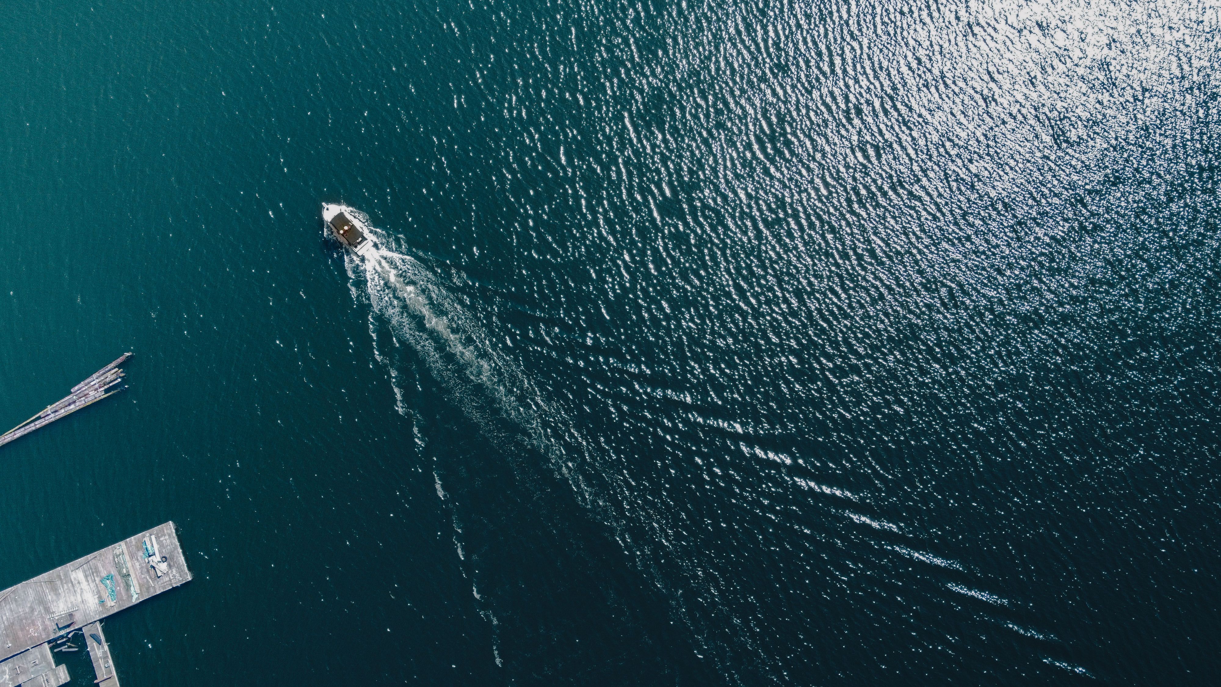 Aerial Photo of a Motorboat Sailing in Sea · Free Stock Photo