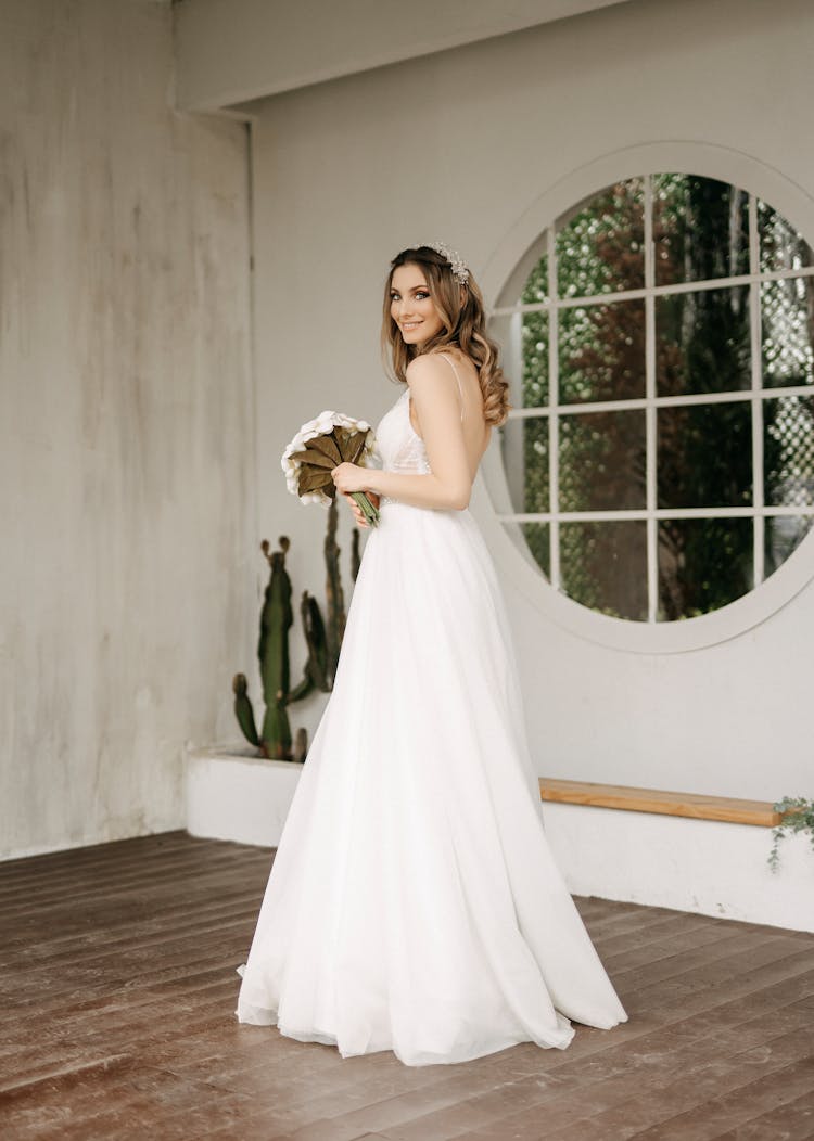 Smiling Bride With Flowers