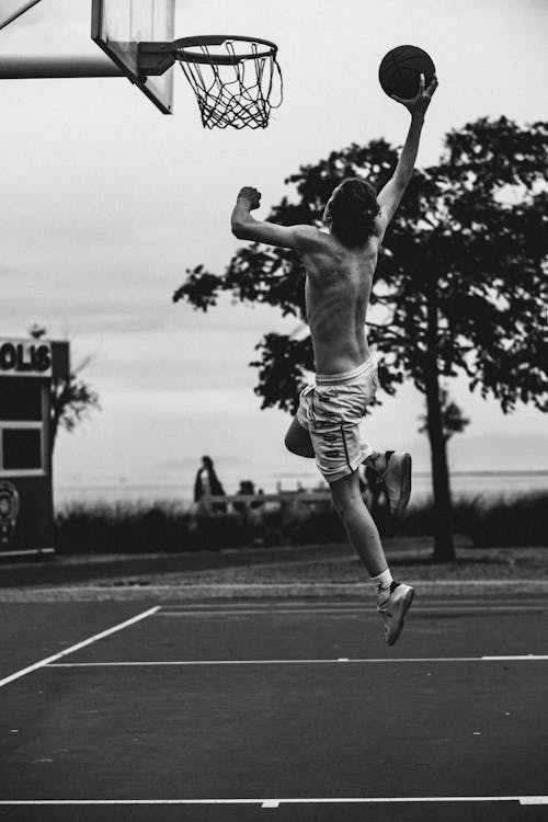 Man Playing Basketball Topless