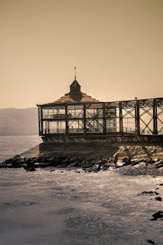 Tranquil view of Mirador de la Punta pavilion at sunset on the Callao coastline, Peru.