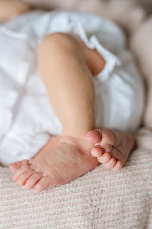 Little Baby Lying on Bed 