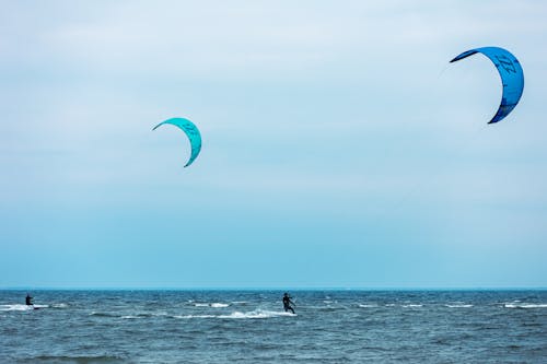 Men Kite Surfing in a Sea 