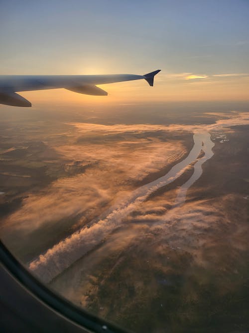 View from a Plane Window at Sunset 