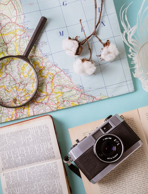 Map and Vintage Camera on a Desk 