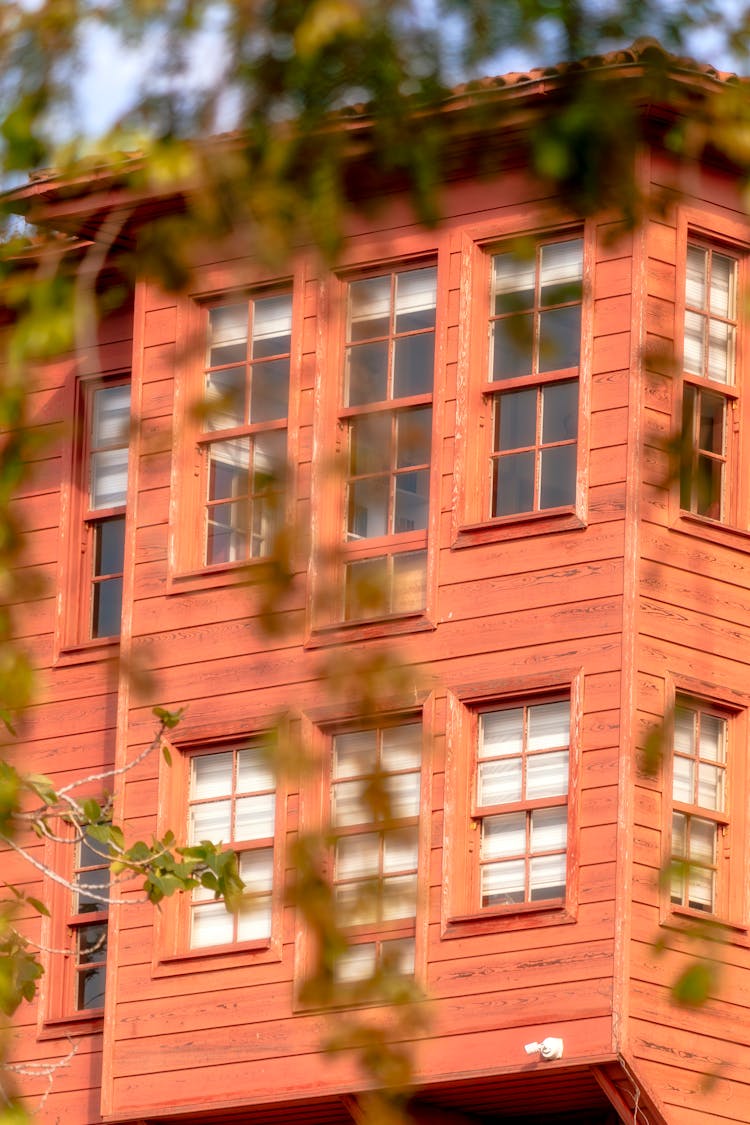 Red Wooden Facade Of House