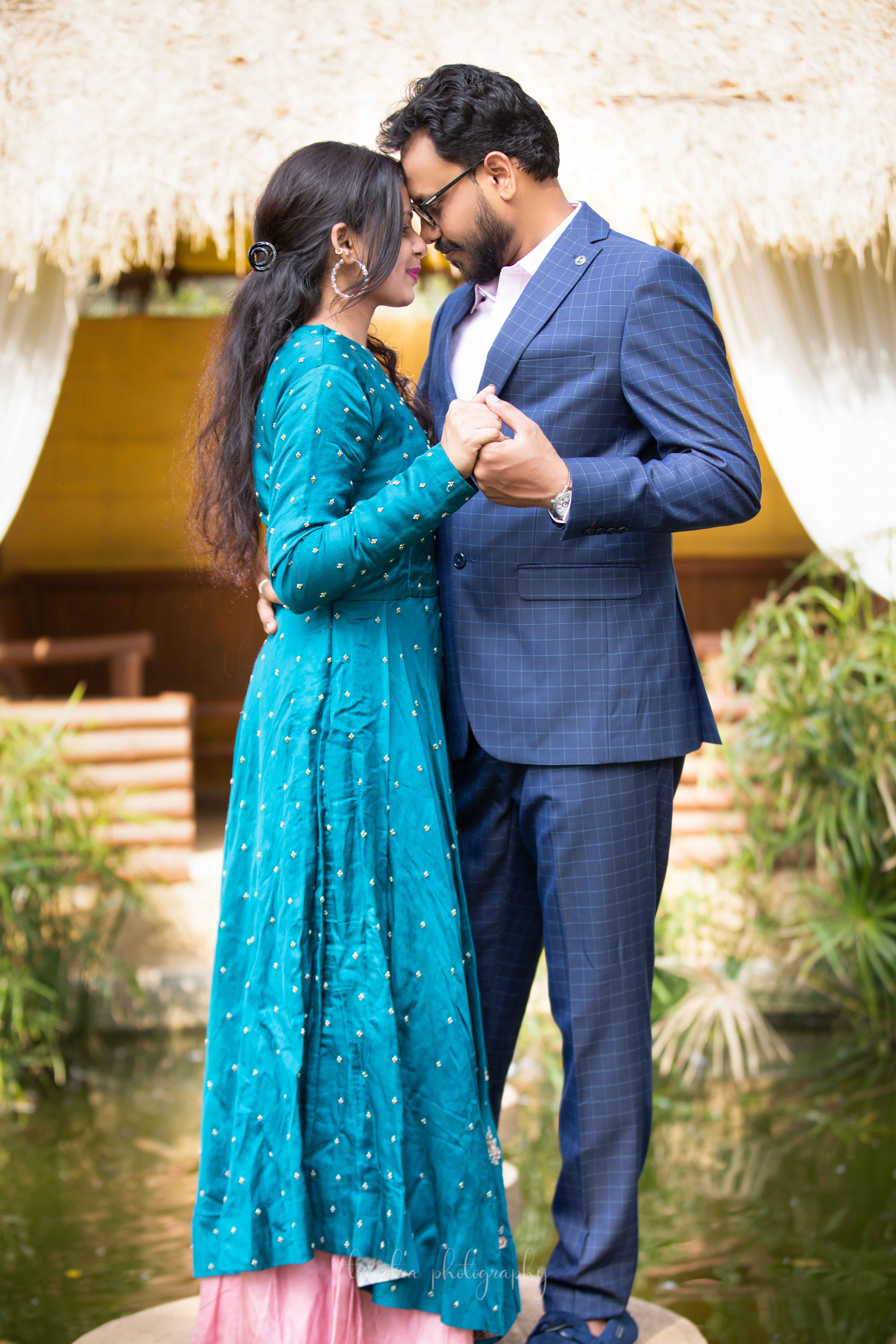 Woman in a Blue Dress and Man in a Suit Dancing · Free Stock Photo