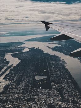 Breathtaking aerial view of Manhattan and Central Park from an airplane window.