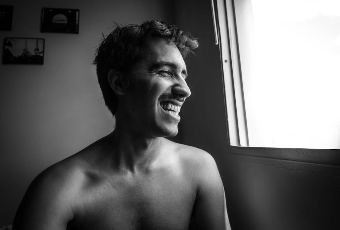 Free Grayscale Photography Of Smiling Man  Stock Photo
