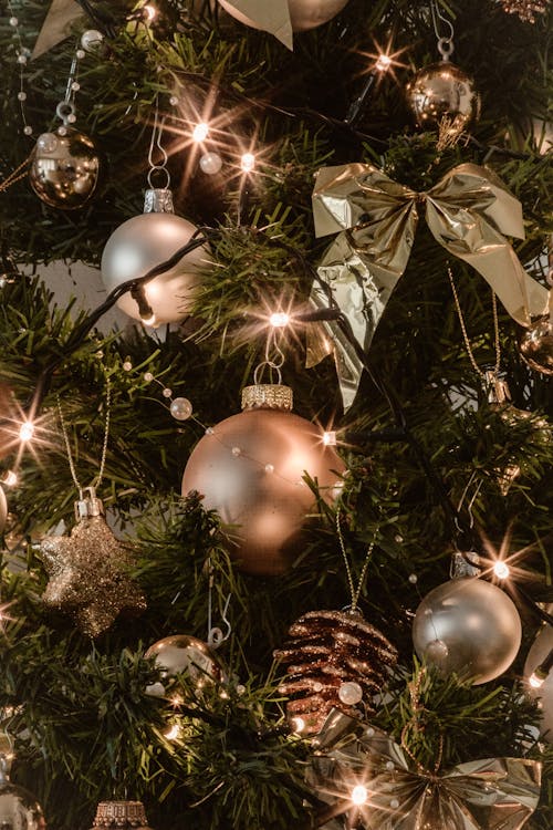 Gray and Gold Baubles Hanging on Christmas Tree