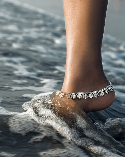 Silver Bracelet on Woman Foot