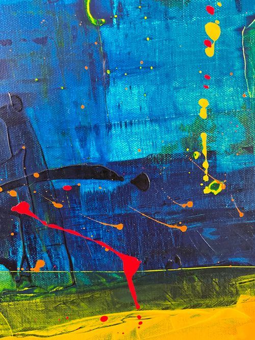 Deep blue abstract canvas with splattered accents — photo by Steve A Johnson on Pexels