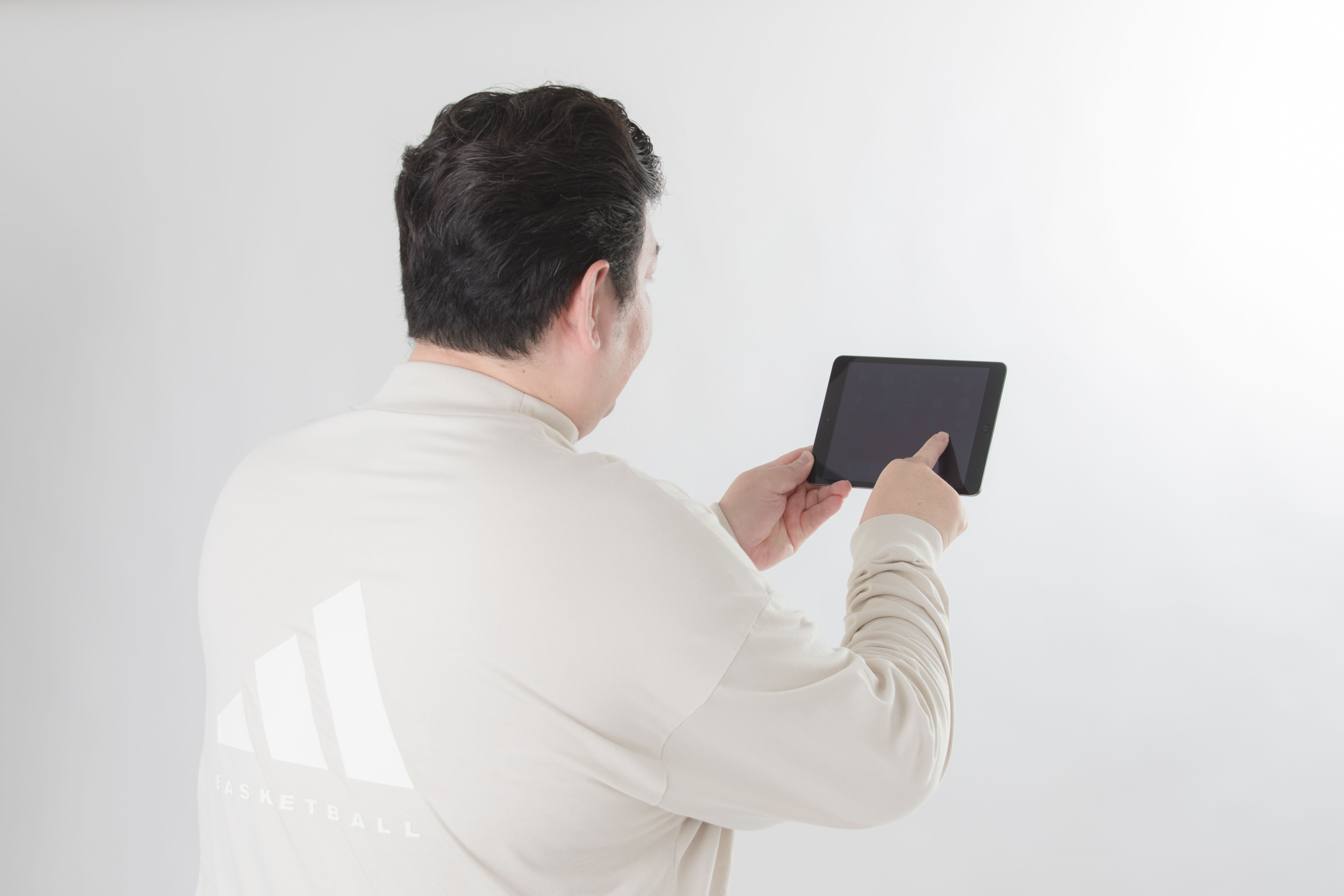 Back View of Man with Tablet · Free Stock Photo