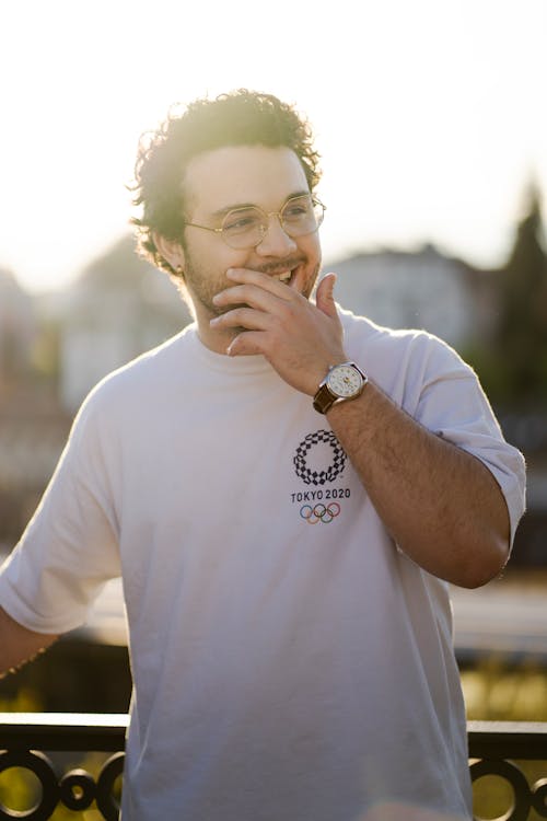 Smiling Man in T-shirt and Eyeglasses