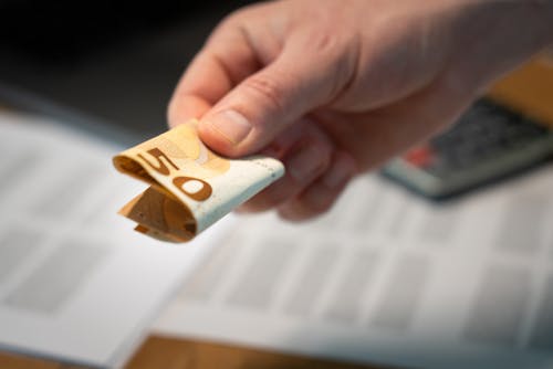 Free Man Hand Holding 50 Euros Stock Photo