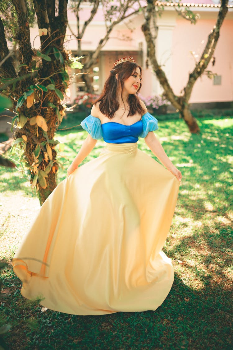 Woman Posing In Queen Dress