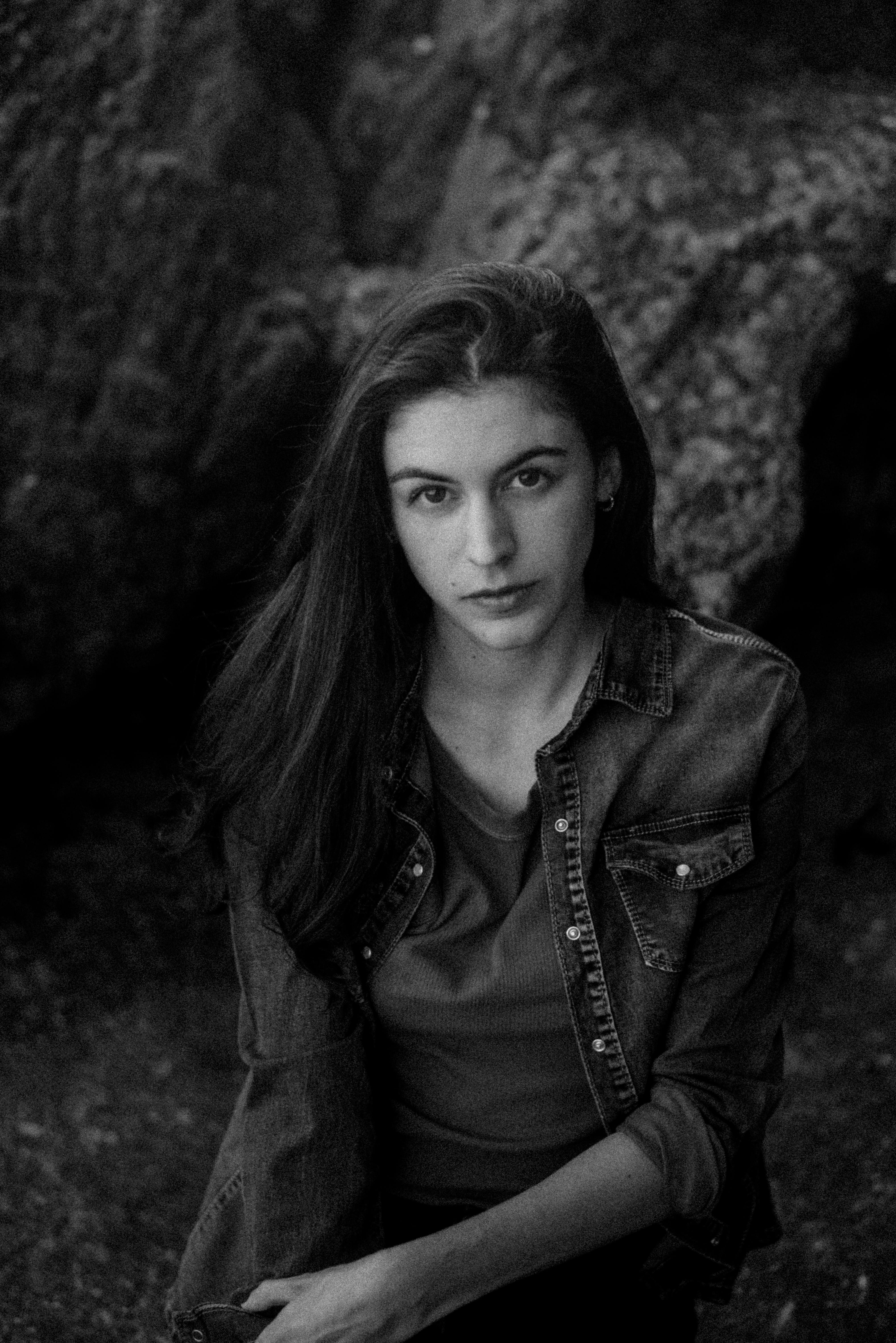 Artistic black and white portrait of a woman captured in Genoa, Italy.