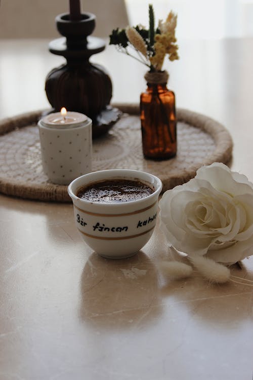 Free Cup of Coffee and White Rose Stock Photo