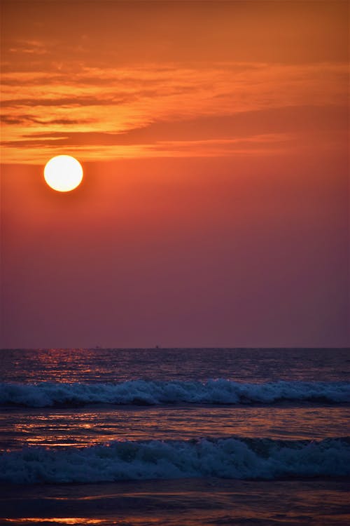 Sun over Sea Shore at Sunset